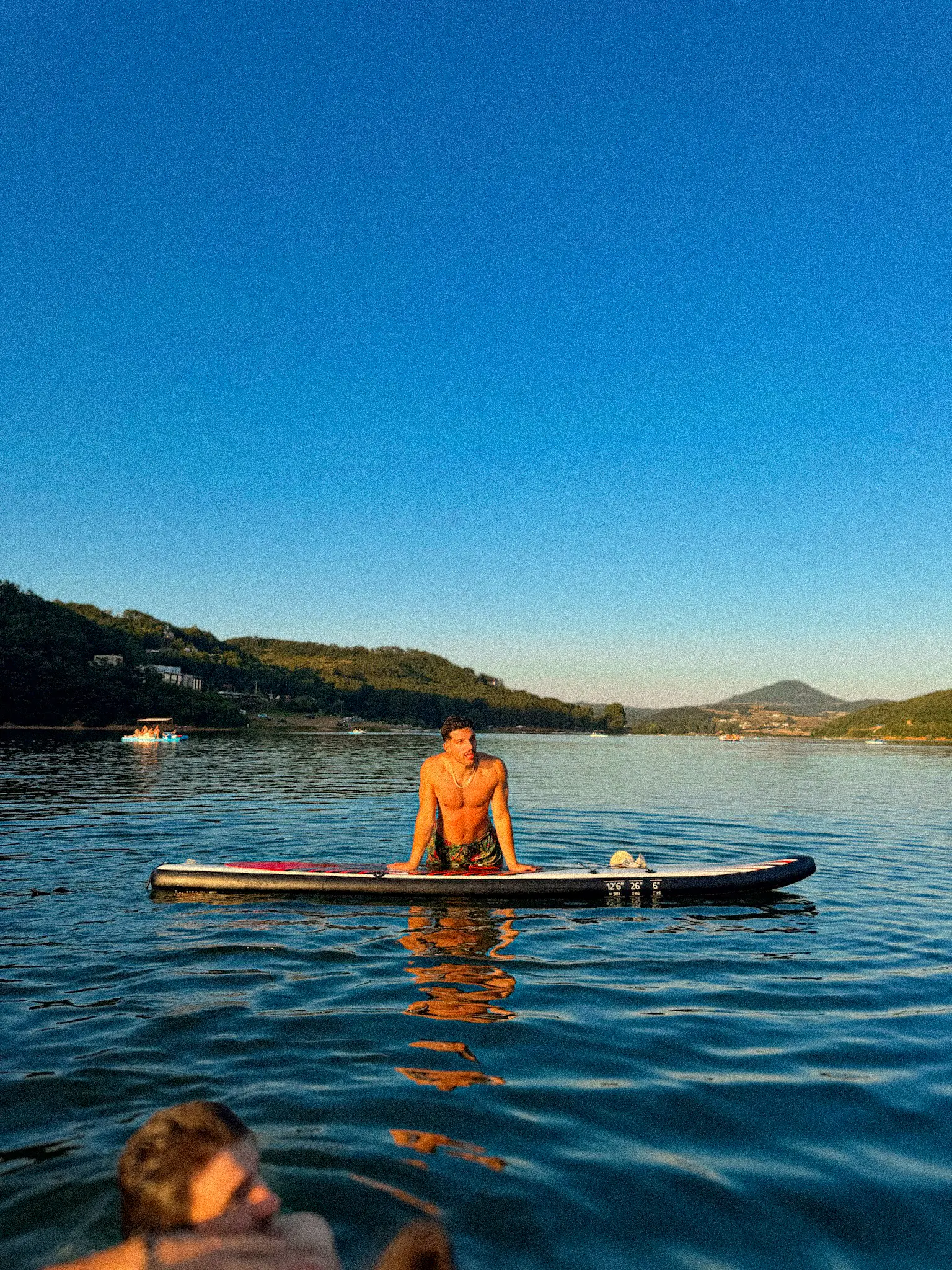 SUP Kosova paddlers on the lake